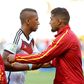 Germany's Jerome Boateng (L) talk s with Ghana's Kevin-Prince Boateng before a Group G match between Germany and Ghana of 2014 FIFA World Cup at the Estadio Castelao Stadium in Fortaleza, Brazil on June 21, 2014.