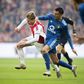 Ajax and Netherlands star Frenkie de Jong (L) in action against Feyenoord's Steven Berghuis (R).