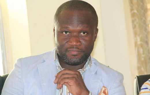 Michael Kweku Ola poses for the camera