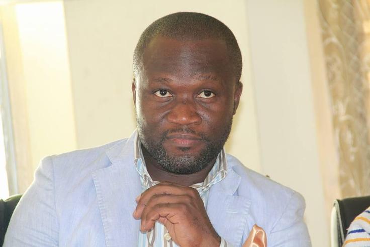 Michael Kweku Ola poses for the camera
