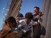 Powerful photos and stories from the caravan show migrants' harrowing journey to the US