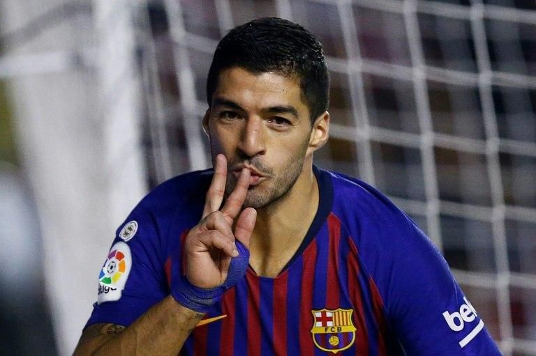Barcelona forward Luis Suarez celebrates after scoring