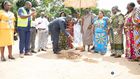 Sammi Awuku cuts sod for ultramodern basketball & volleyball court in Okuapeman school