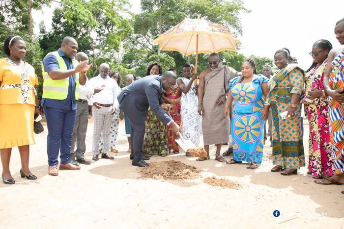 Sammi Awuku cuts sod for ultramodern basketball & volleyball court in Okuapeman school