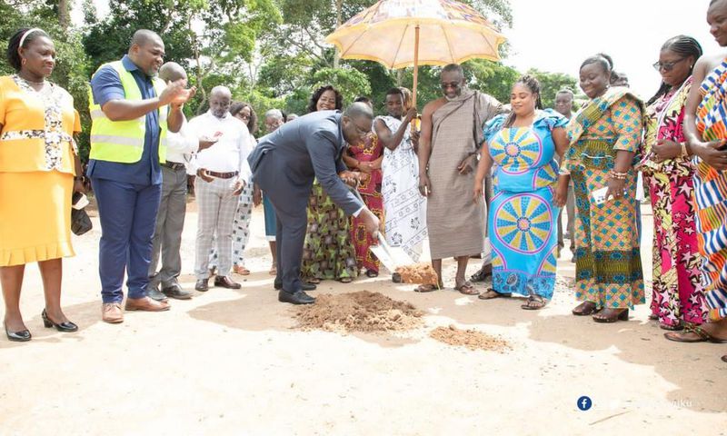 Sammi Awuku cuts sod for ultramodern basketball & volleyball court in Okuapeman school