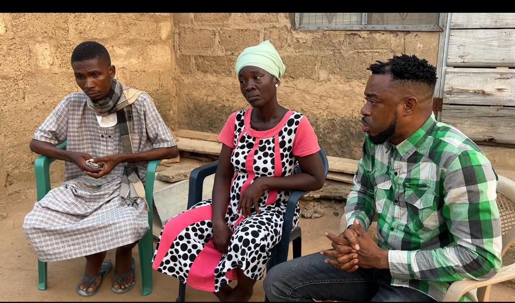 Corporal Simon Agbeko and Emmanuel Ohene and his mother