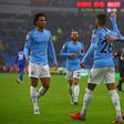 Manchester City's Riyad Mahrez celebrates with team-mates after scoring his second goal