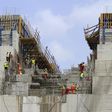 Construction workers are seen in a section of Ethiopia's Grand Renaissance Dam, as it undergoes construction, during a media tour along the river Nile in Benishangul Gumuz Region, Guba Woreda, in Ethiopia March 31, 2015.   REUTER/Tiksa Negeri