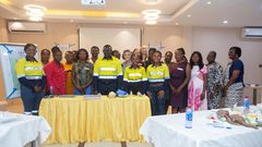 Newmont and Project C.U.R.E officials with health professionals.