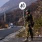 A soldier of the NATO-led peacekeeping mission in Kosovo (KFOR) secures the area near the village of Rudare in northern Mitrovica during a protest of Kosovo Serbs on November 23, 2018