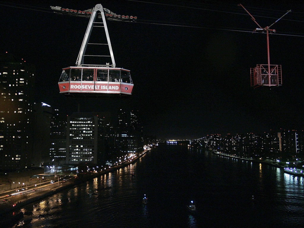 One of New York City's most affordable tourist experiences is a tram that takes you 250 feet above the city for the price of a subway fare
