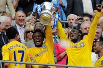 John Mikel Obi and Essien lifting the FA Cup
