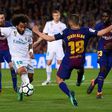 Barcelona's Spanish defender Jordi Alba (R) vies with Real Madrid's Brazilian defender Marcelo on May 6, 2018.
