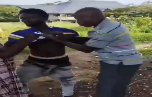 Chief Inspector and suspect engage in dramatic wrestling during arrest