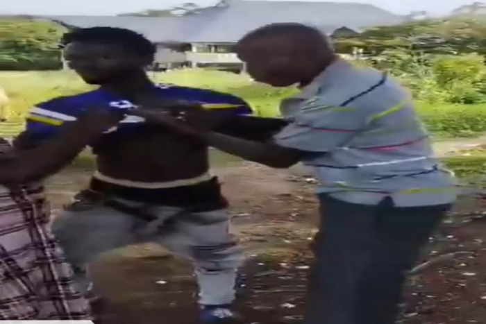 Chief Inspector and suspect engage in dramatic wrestling during arrest
