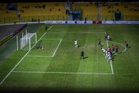 The Gambian goalkeeper saves Musibau Aziz's penalty.