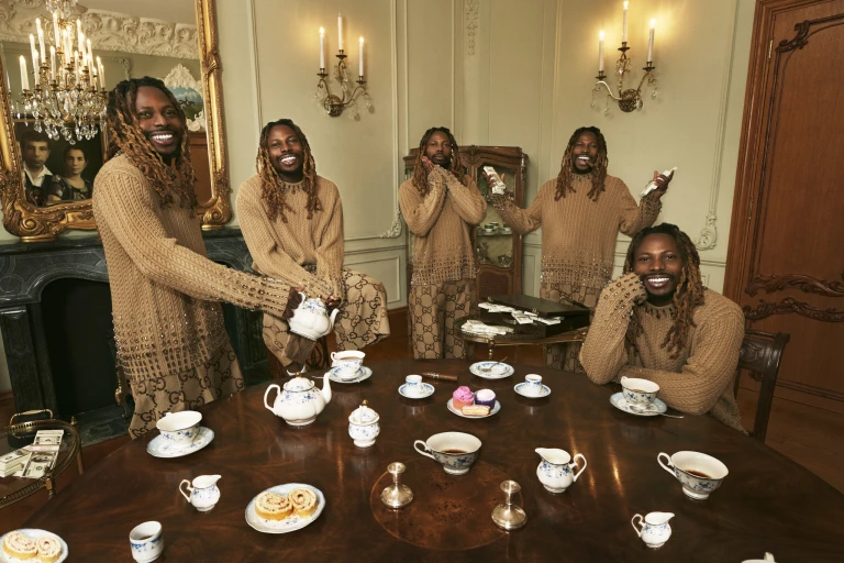 Asake having tea with Asakes [Ssense]