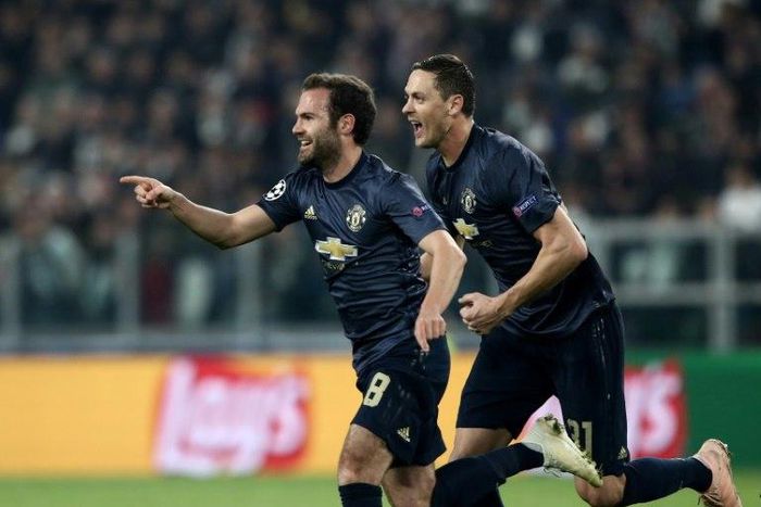 Spanish midfielder Juan Mata (L) came on in the 79th minute to pull Man United back into the game