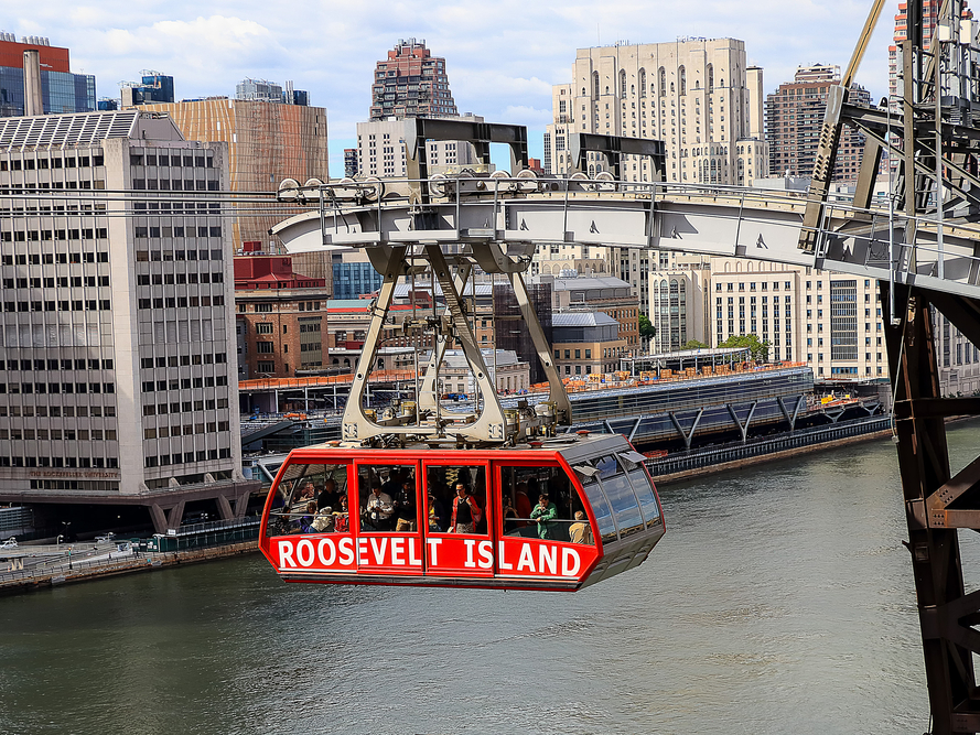 One of New York City's most affordable tourist experiences is a tram that takes you 250 feet above the city for the price of a subway fare