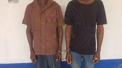Police arrest two men for erecting unauthorized roadblocks