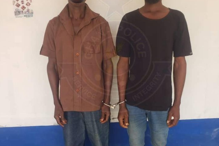 Police arrest two men for erecting unauthorized roadblocks