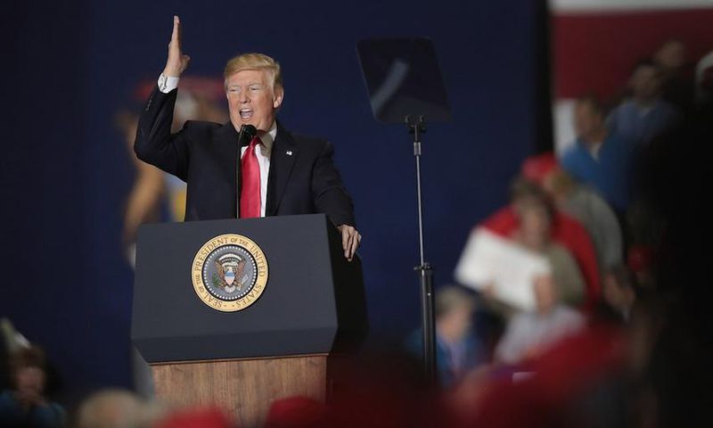 President Donald Trump at a rally in Washington, Michigan.