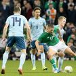 Republic of Ireland's Conor Hourihane battles for the ball against rivals Northern Ireland