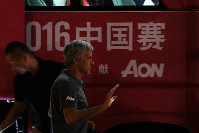 Manchester United coach Jose Mourinho blamed the lack of a police escort for his side's late arrival against Valencia