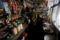 An island in India is disappearing, but some of the last residents say they can't afford to move away