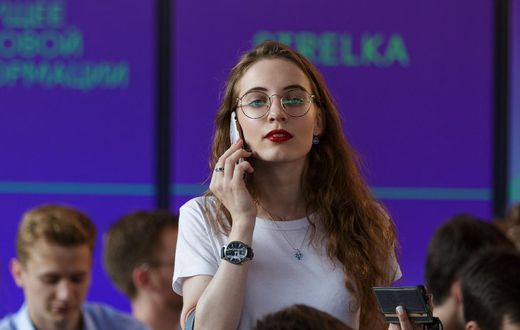 millennial on phone woman phone