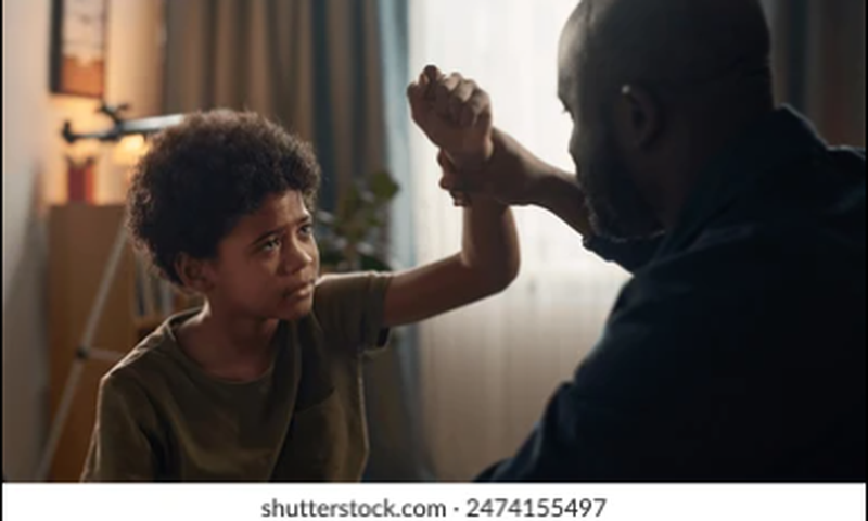 Father beating son [Shutterstock]