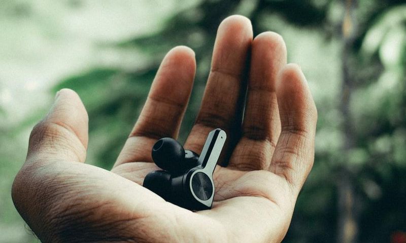 Wireless earphones in a person's hand [Image: Swamy K]