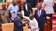 Vice president of Ghana, Dr. Bawumia & Finance Minister Ken Ofori-Atta hug on floor of parliament
