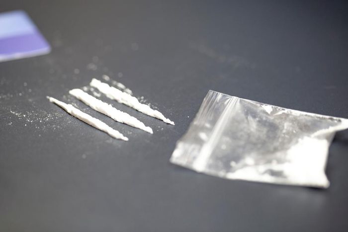 A stock photo shows a bag of cocaine with lines of the drug.Getty Images
