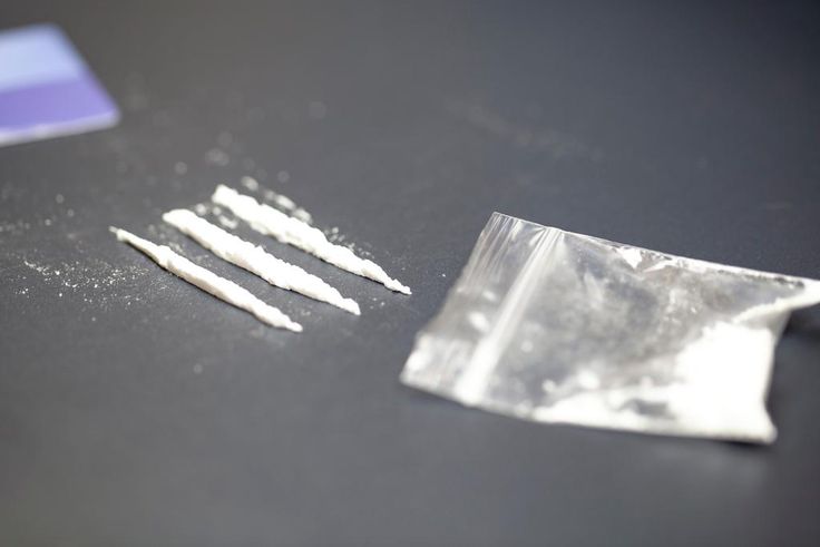 A stock photo shows a bag of cocaine with lines of the drug.Getty Images