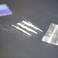 A stock photo shows a bag of cocaine with lines of the drug.Getty Images