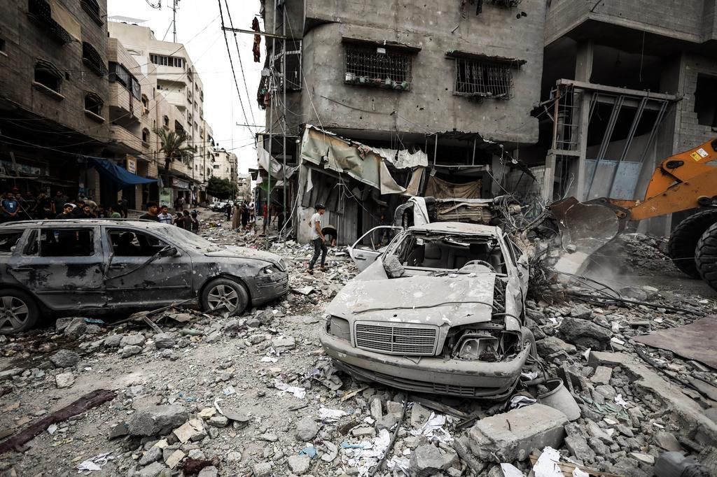 The rubble of destroyed buildings and cars after an Israeli air strike in Gaza City, on October 9, 2023.Sameh Rahmi/NurPhoto/Getty Images