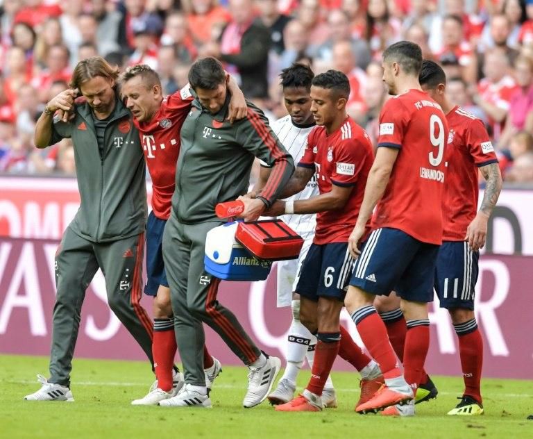 Bayern Munich's Brazilian defender Rafinha (second from left) will be sidelined for several weeks after tearing ankle ligaments at Bayer Leverkusen on Saturday. In the same game, Corentin Tolisso tore his cruciate knee ligament.