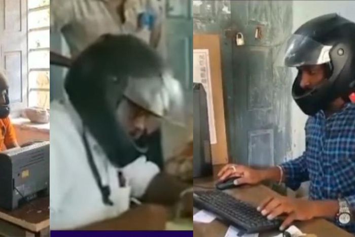 Workers wear motorcycle helmets due to falling debris from dilapidated office