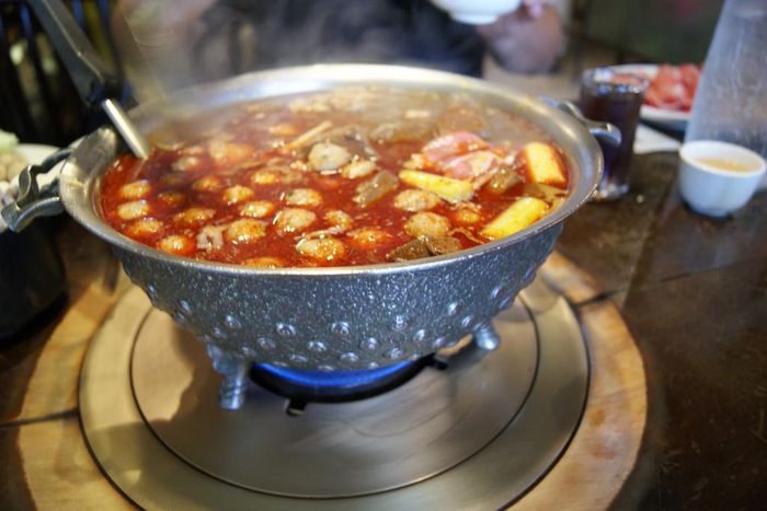 Poor woman in critical condition as fish seller pours hot soup on her over GHC debt