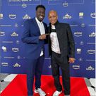 Andre Ayew and French video journalist Pape Seck