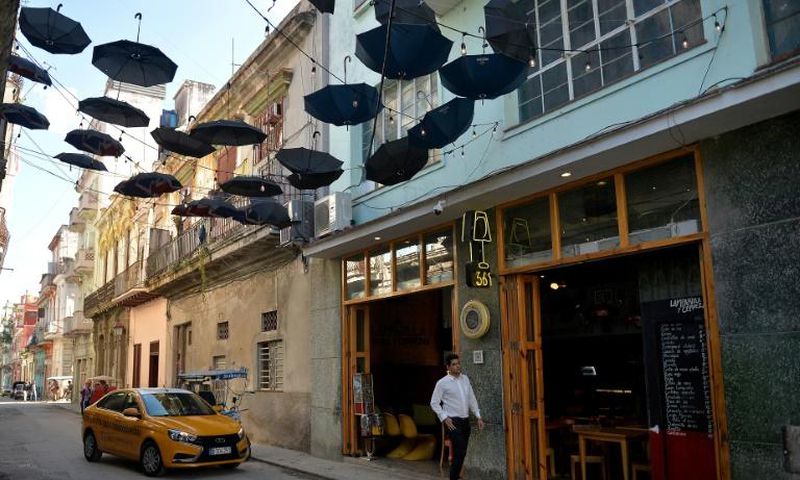 A taxi arrives at a private restaurant in Havana, Cuba, where entrepreneurs will soon be subjected to tougher restrictions