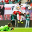 French forward Jean-Kevin Augustin (R) is one of the players in hot water with RB Leipzig coach Ralf Rangnick after being caught using his mobile phone before a Europa League game.