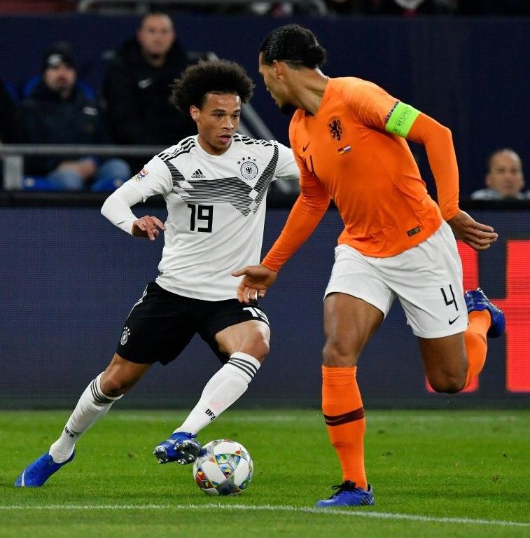 Germany's forward Leroy Sane (L), who was outstanding in Gelsenkirchen, and Netherlands' defender Virgil van Dijk (R) both scored in Monday's stunning 2-2 draw, which was enough to put the Dutch into the Nations League's semi-finals.