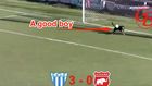 Dog makes a save in a soccer game