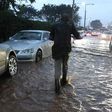 Heavy traffic on a Kenyan road during the rainy season