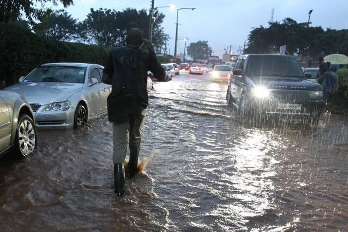 Heavy traffic on a Kenyan road during the rainy season