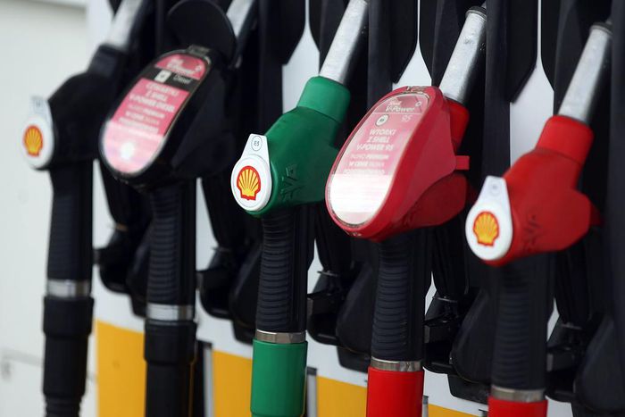 A row of fuel pumps of a fuel distributor at Shell gas station.