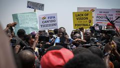 #SaveGhanaFootball-protest Leader Saddick Adams speaks to the protesters in front of the Independence Arch in Accra. Photos by Nicolas Horni