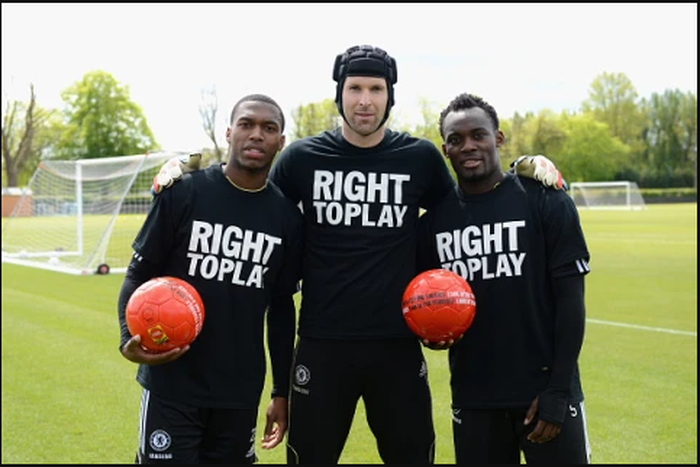 Daniel Sturridge congratulates Michael Essien for acquiring UEFA A coaching license